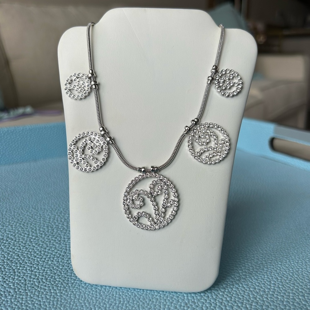 New in box touchstone Crystal by Swarovski swirl necklace